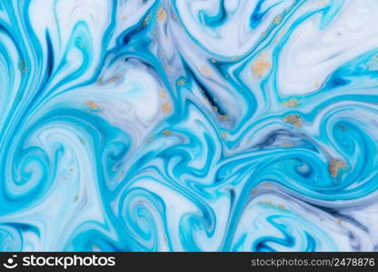 Marbled unique blue abstract background with gold dust. Flowing liquid marble texture.