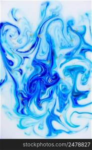 Marbled unique blue white and gold abstract background. Flowing liquid marble texture