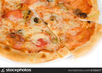 Margarites pizza closeup of mozzarella, tomato, and olive