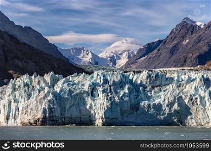 Margerie glacier in Alaska, Glacier Bay national park. Close view of the glacier texture, crispy blue ice lit by the Sun.