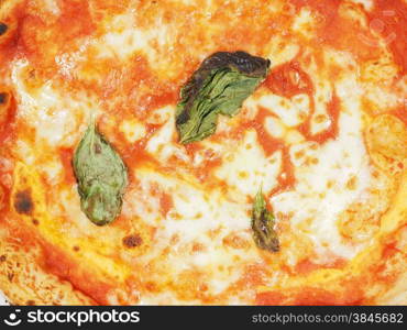 Margherita pizza background. Margherita aka margarita traditional Italian pizza useful as a background