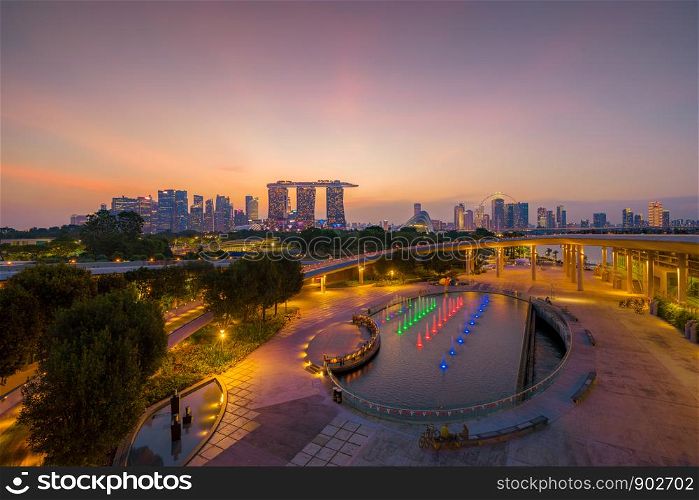 Marina Barrage. Singapore Downtown skyline at sunset. Financial district and business centers in technology smart urban city in Asia. Skyscraper and high-rise buildings.