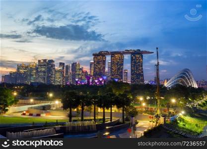 Marina Bay Sands Hotel and Garden by the Bay and singapore flyer it is Symbol or Landmark of Singapore most popular for tourist in twilight time