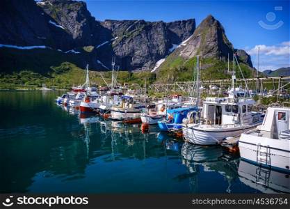 Marina boat Lofoten islands in the county of Nordland, Norway. Is known for a distinctive scenery with dramatic mountains and peaks, open sea and sheltered bays, beaches and untouched lands.