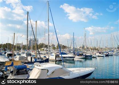 Marina of Larnaca with yachts and motorboats, cityscape in background, Cyprus