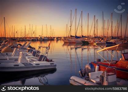 Marina with docked yachts at sunset in Giulianova, Italy