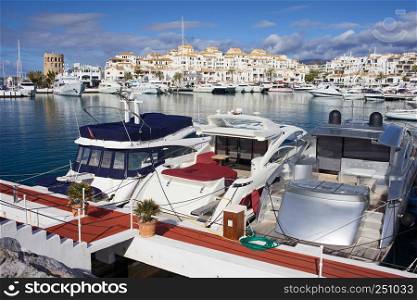 Marina with luxury yachts in resort town of Puerto Banus on Costa del Sol in Spain, near Marbella, Andalusia region.