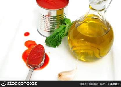 Marinara Sauce Ingredients. Marinara sauce ingredients including Olive oil, Basil leaves, fresh garlic and tomato sauce