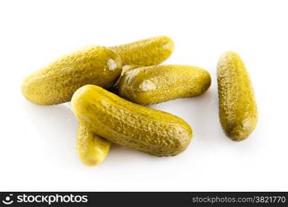 marinated pickled cucumbers isolated on white.