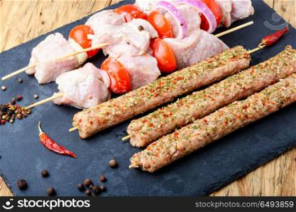 Marinated pork kebab on stick. Kebab, threaded on skewers pieces of meat