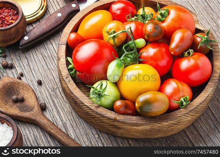 Marinated tomatoes with spices.Canning tomatoes.Pickling of ripe tomatoes. Autumn tomato preservation