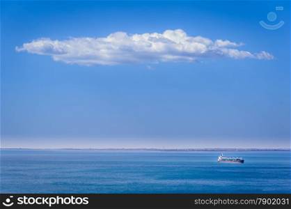 Marine scene with the ship and cloud