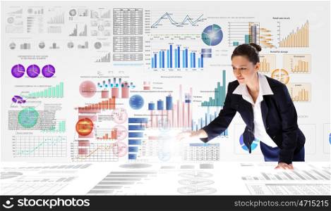 Market business. Young businesswoman and statistics information on table