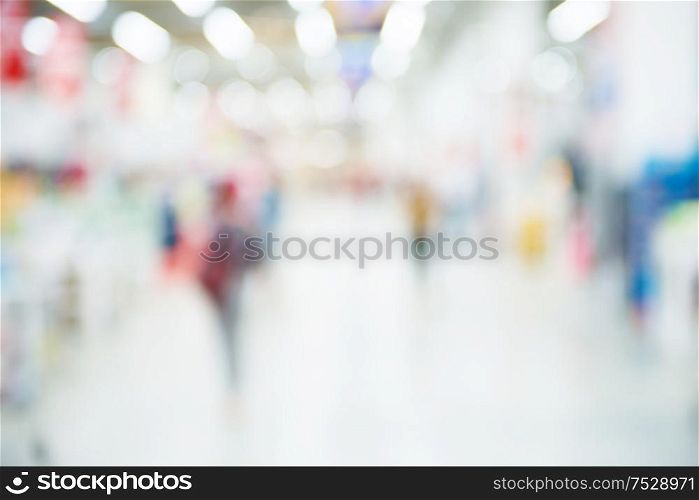 Market shop and supermarket interior with customers as blurred store background