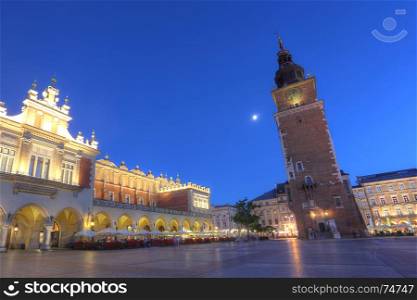 Market square in Krakow at sunset. Sukiennice and Ratusz. Poland