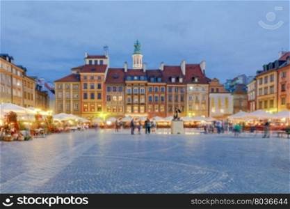 Market Square in the historical part of the city at sunset. Warsaw. Poland.. Warsaw. Market Square.