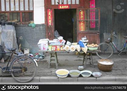 Market stall in front of a door, Pingyao, Shaanxi Province, China