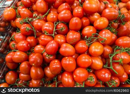 Market stall with lots of tomatoes