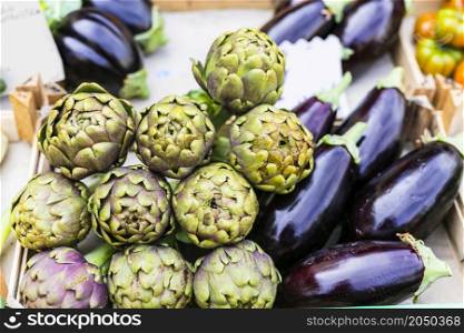 Market still life. fresh veggetables eggplants and artichoke close up. Rome, Italy, campo di Fiori