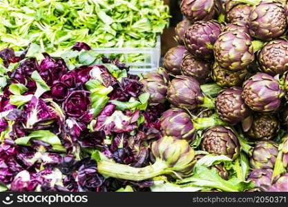 Market still life. fresh veggetables Lettuce and artichoke close up. Rome, Italy, campo di Fiori