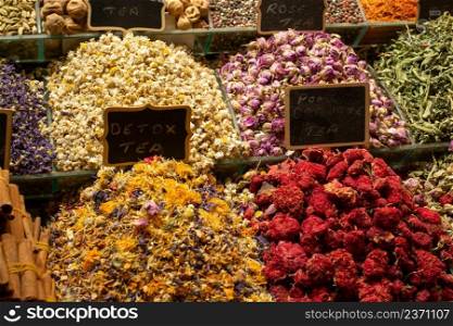 Market with different types of   tea , herbs, plants and dried flowers