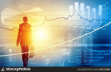 Marketing concept. Silhouette of businesswoman standing with back and infographs at background