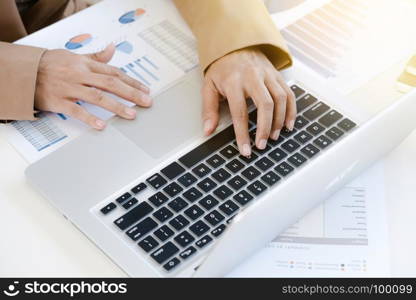 marketing performance analyst working with sale report on a office desk