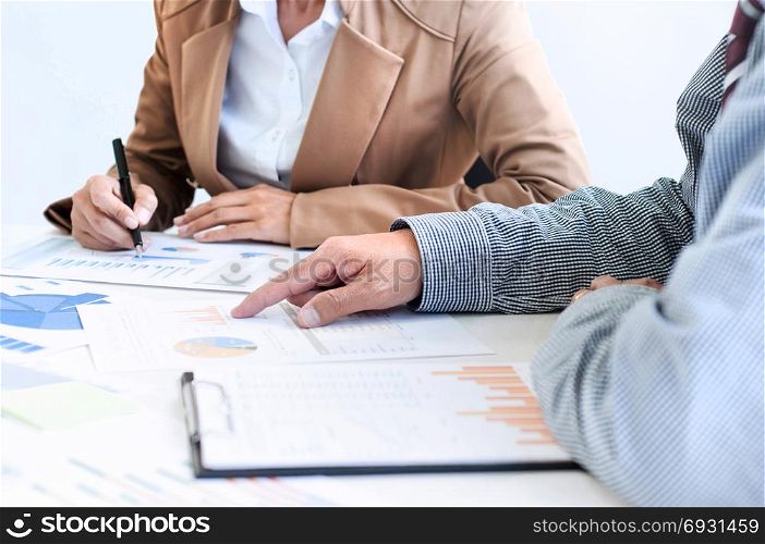 marketing performance analyst working with sale report on a office desk