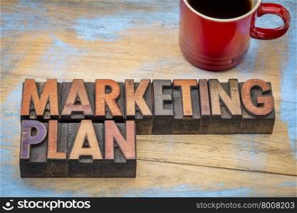 marketing plan - word abstract in vintage letterpress wood type blocks stained by color inks