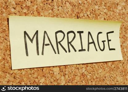 marriage concept word on a sticky note