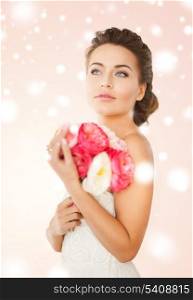 marriage, floral, bridal concept - young woman with bouquet of flowers