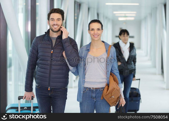 married couple arriving to the airport