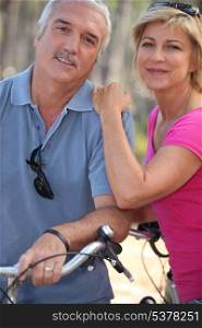 Married couple enjoying bike ride