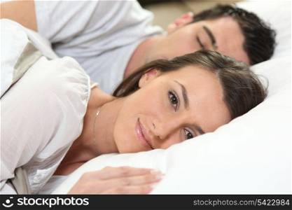 Married couple in bed