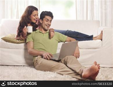 Married couple with a laptop
