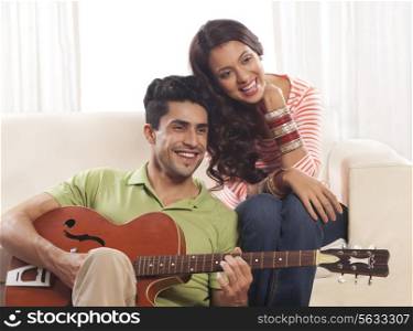 Married couple with guitar