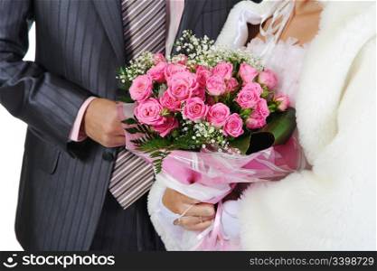 Married with a bouquet of pink roses. Isolated on white background