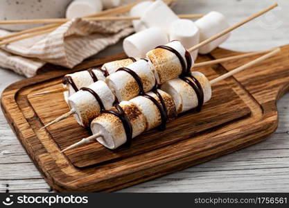 marshmallow on old wooden table. marshmallow on table