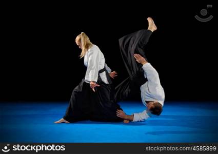 Martial arts fighters isolated on black