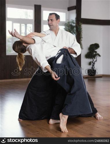 martial arts instructors training practice hall