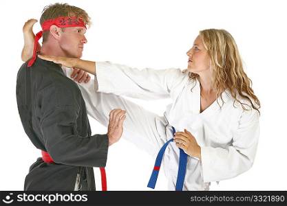 Martial arts man and woman fighting