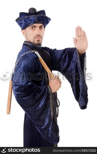 Martial arts master with nunchucks on white