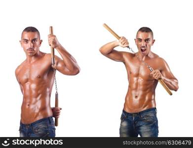 Martial arts warrior with nunchucks on white