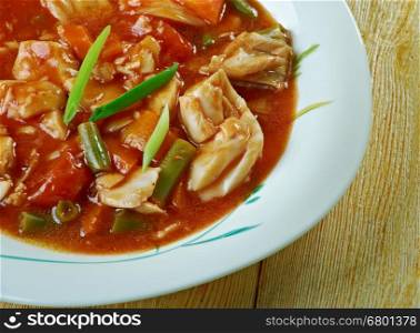 Maryland crab soup.East coast crab soup with chunky pieces of tomato, potatoes, vegetables and crab