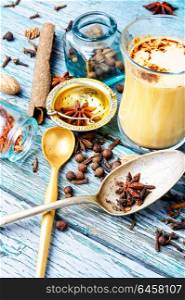 Masala tea with spices. Glass cup of traditional indian masala tea.Masala chai