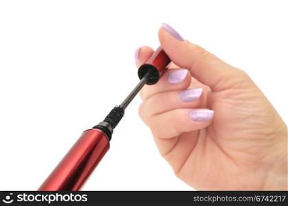 mascara in hand isolated on a white