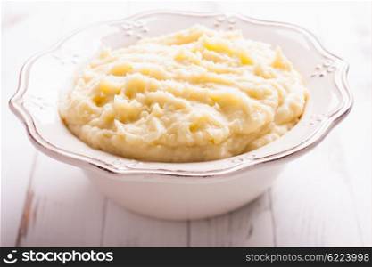 Mashed potato in a bowl on the table. The mashed potato