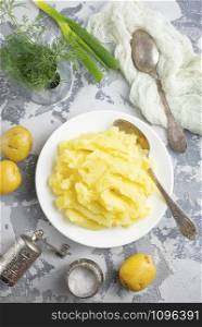 mashed potato with butter in white bowl