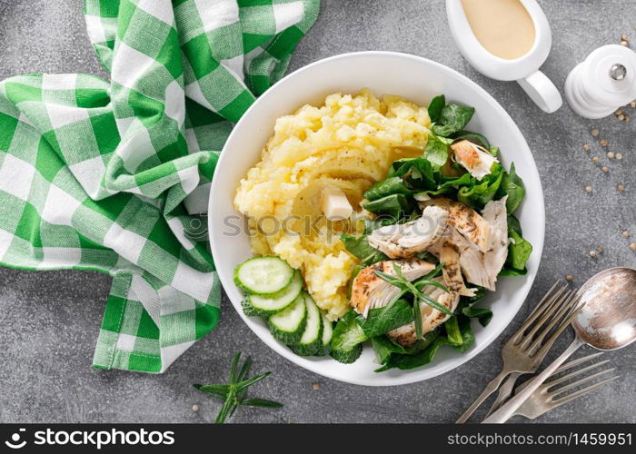 Mashed potato with grilled chicken and spinach salad