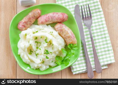 Mashed potato with sausages